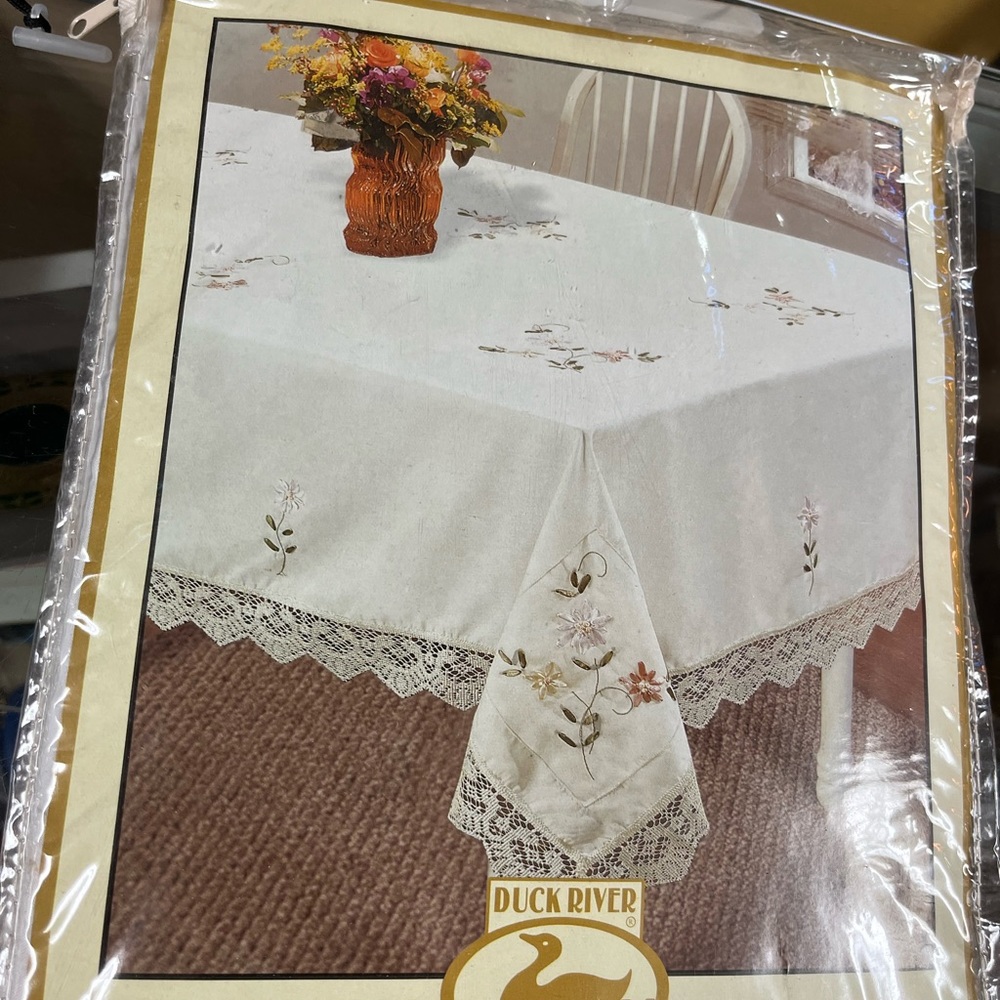 Tablecloth with flower design and Lace trim 60x84”